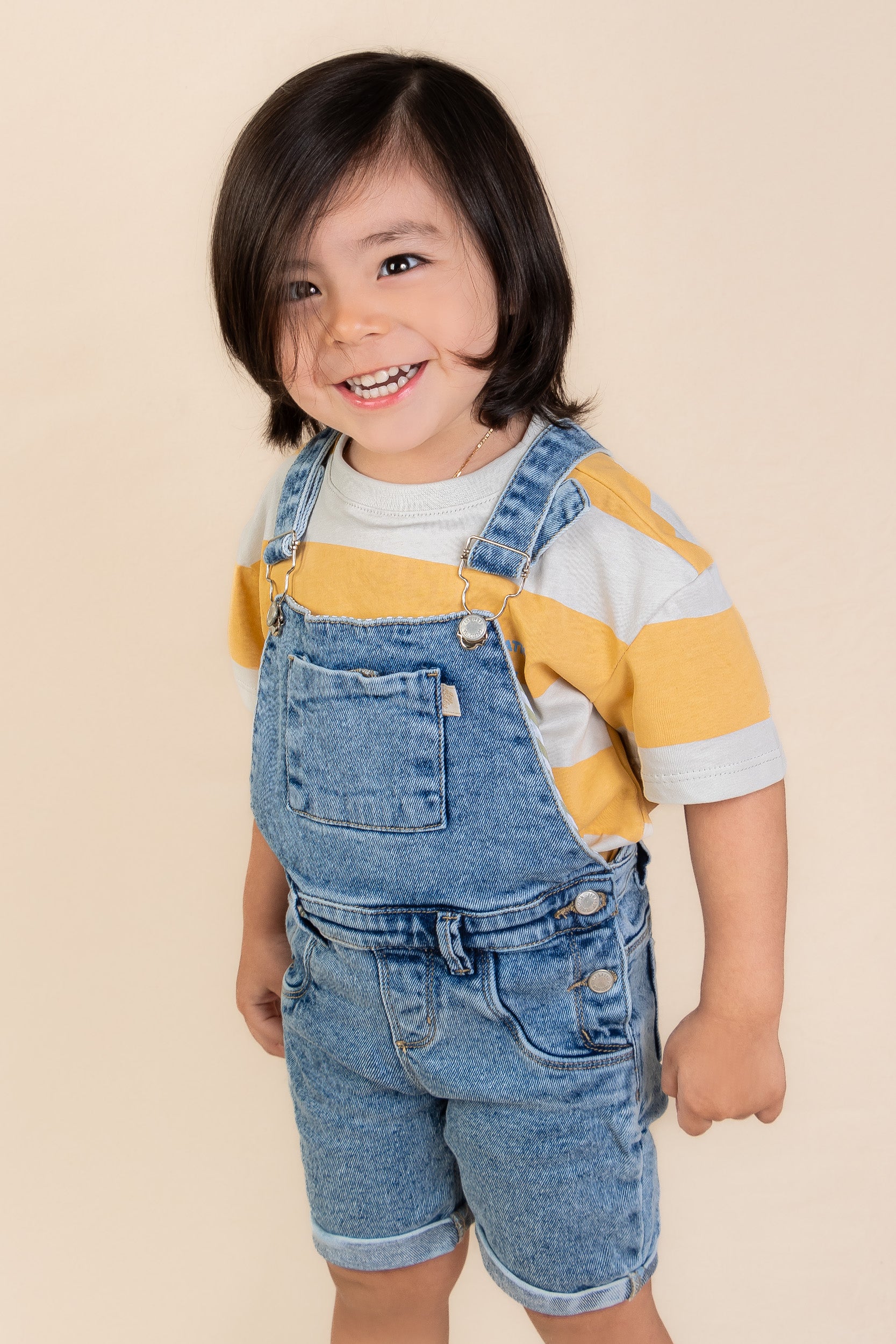 OVEROL DENIM CORTO NIÑO AMARILLO