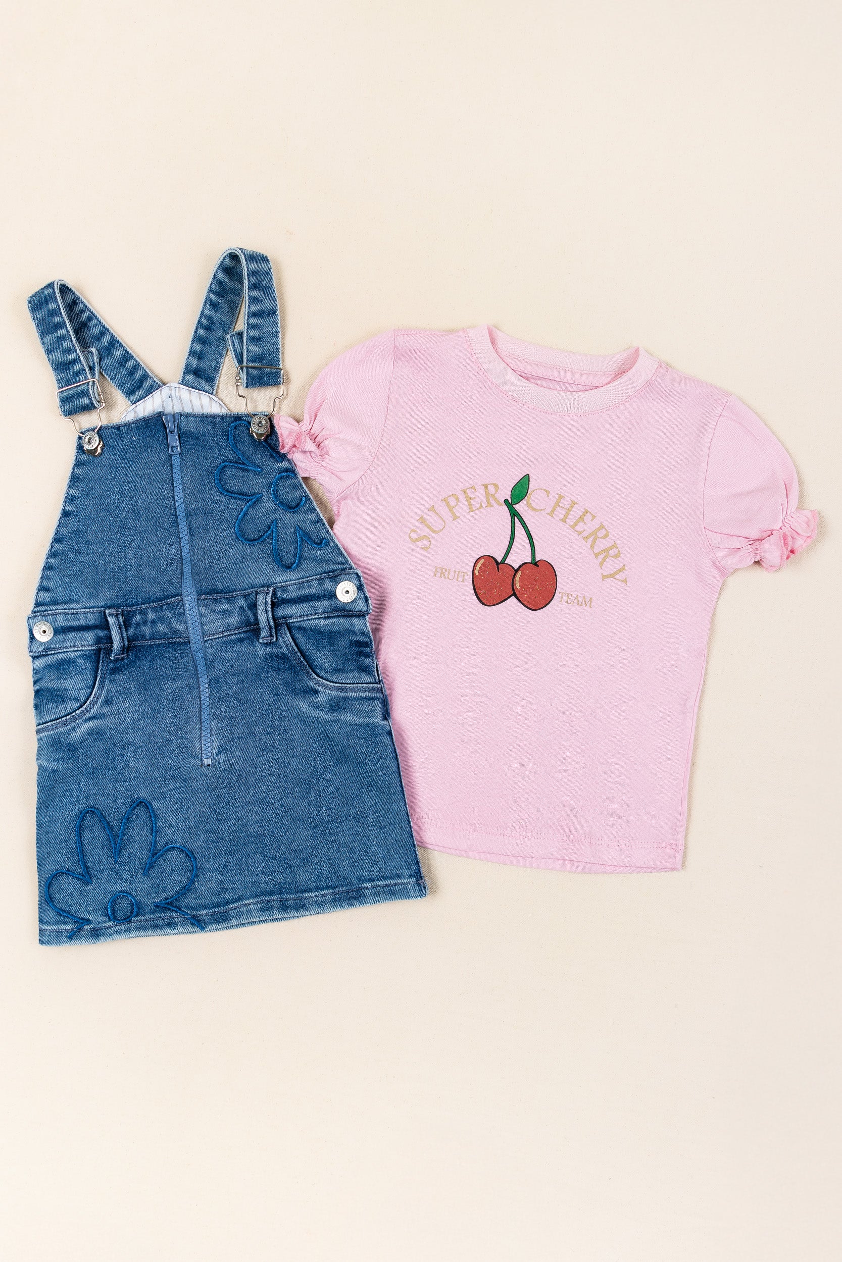 CONJUNTO OVEROL FALDA CHERRY NIÑA ROSADO