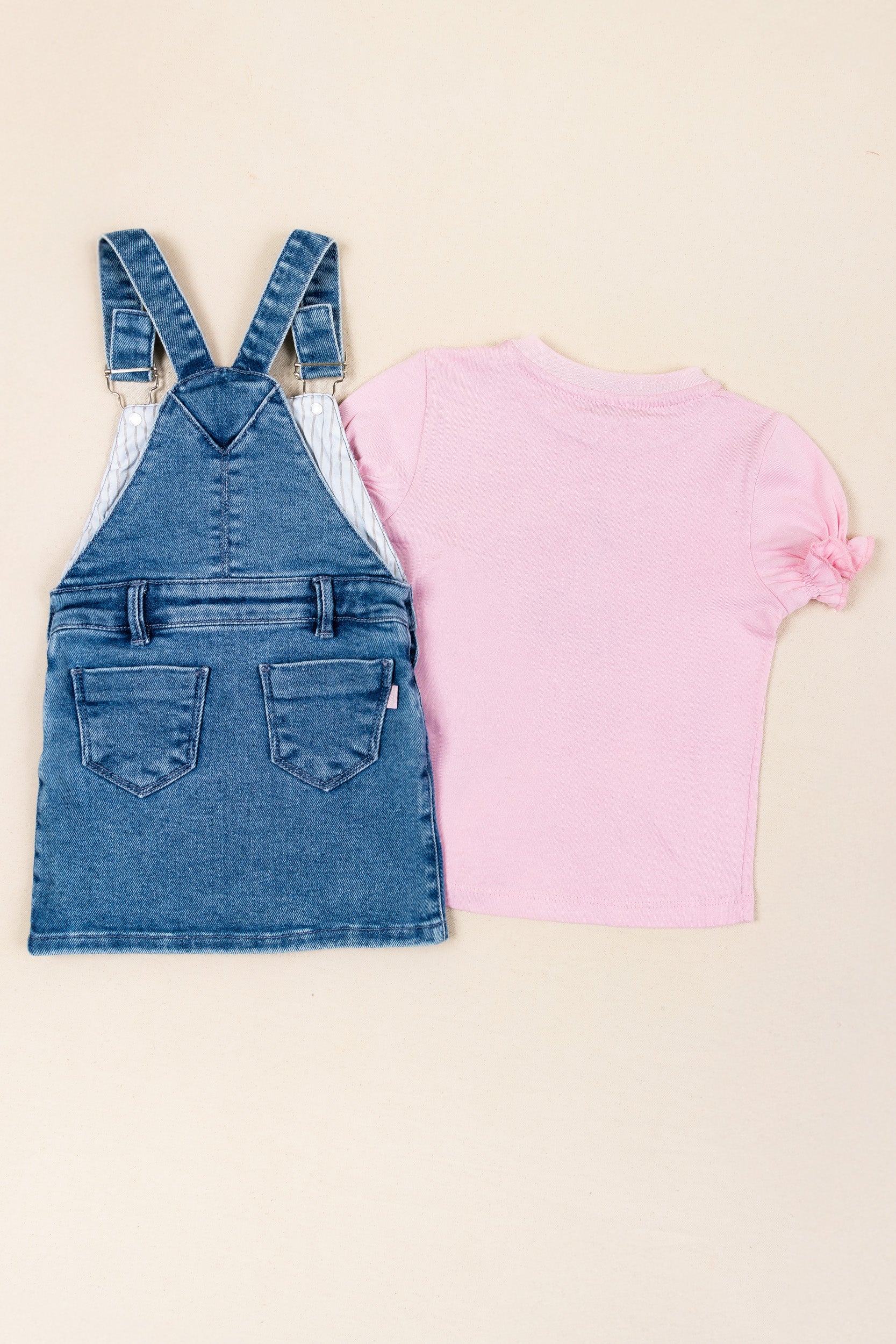 CONJUNTO OVEROL FALDA CHERRY NIÑA ROSADO