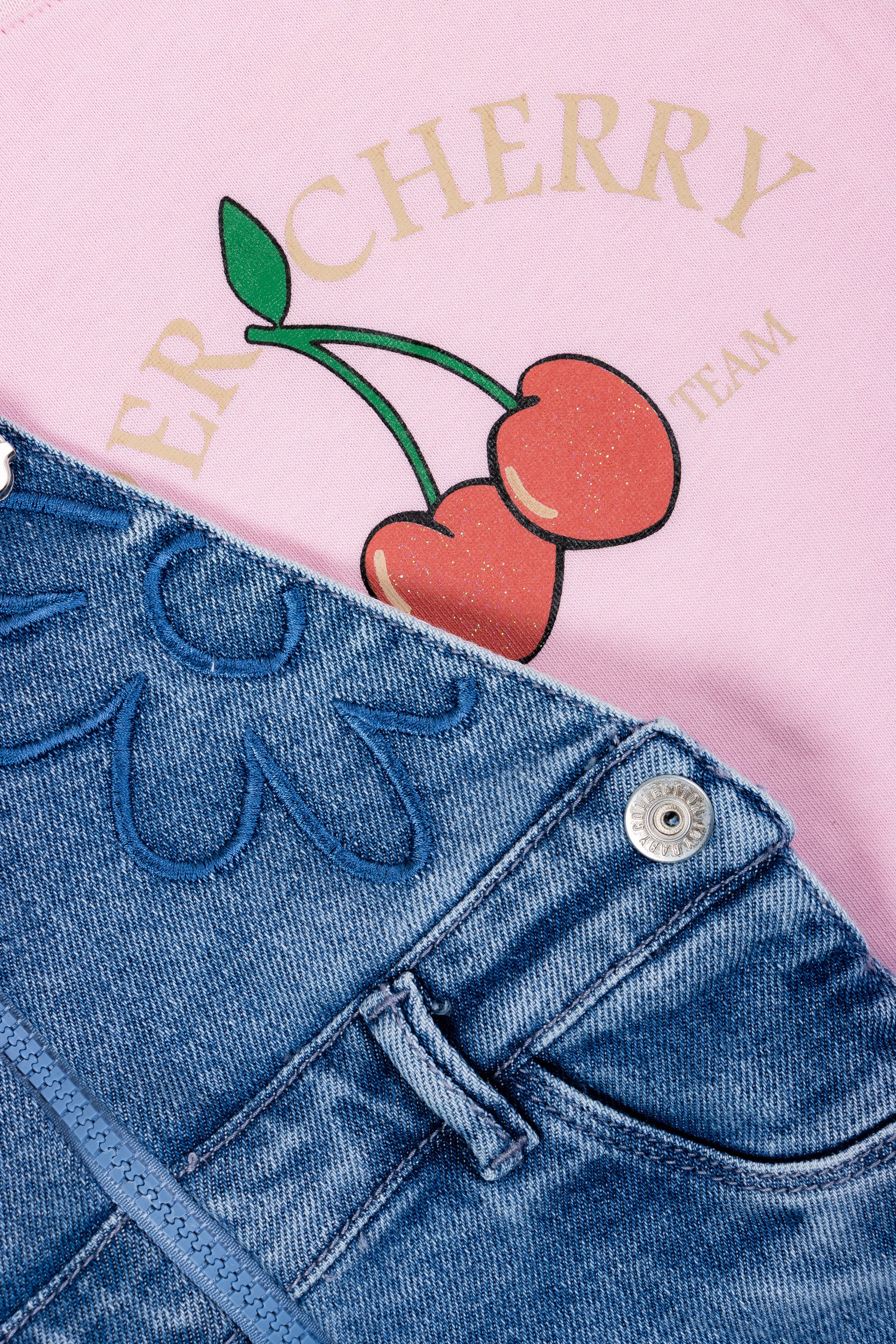 CONJUNTO OVEROL FALDA CHERRY NIÑA ROSADO