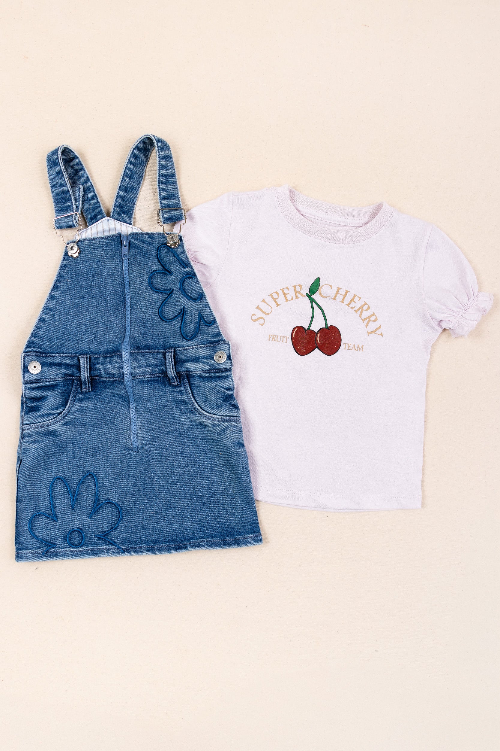 CONJUNTO OVEROL FALDA CHERRY NIÑA LILA