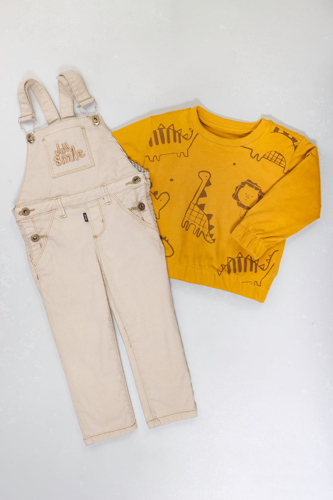 CONJUNTO OVEROL NIÑO DINO MOSTAZA