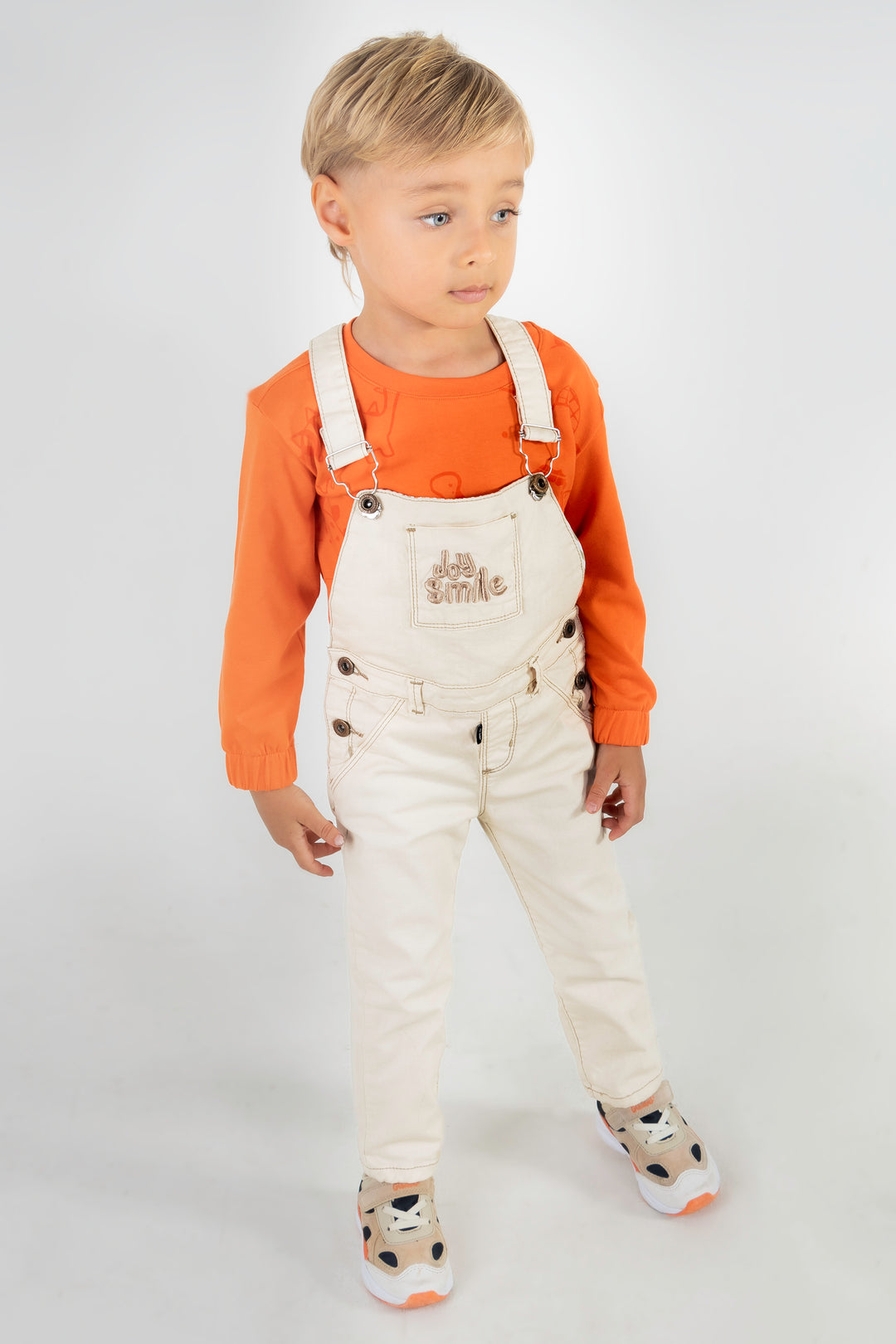 CONJUNTO OVEROL NIÑO DINO NARANJA