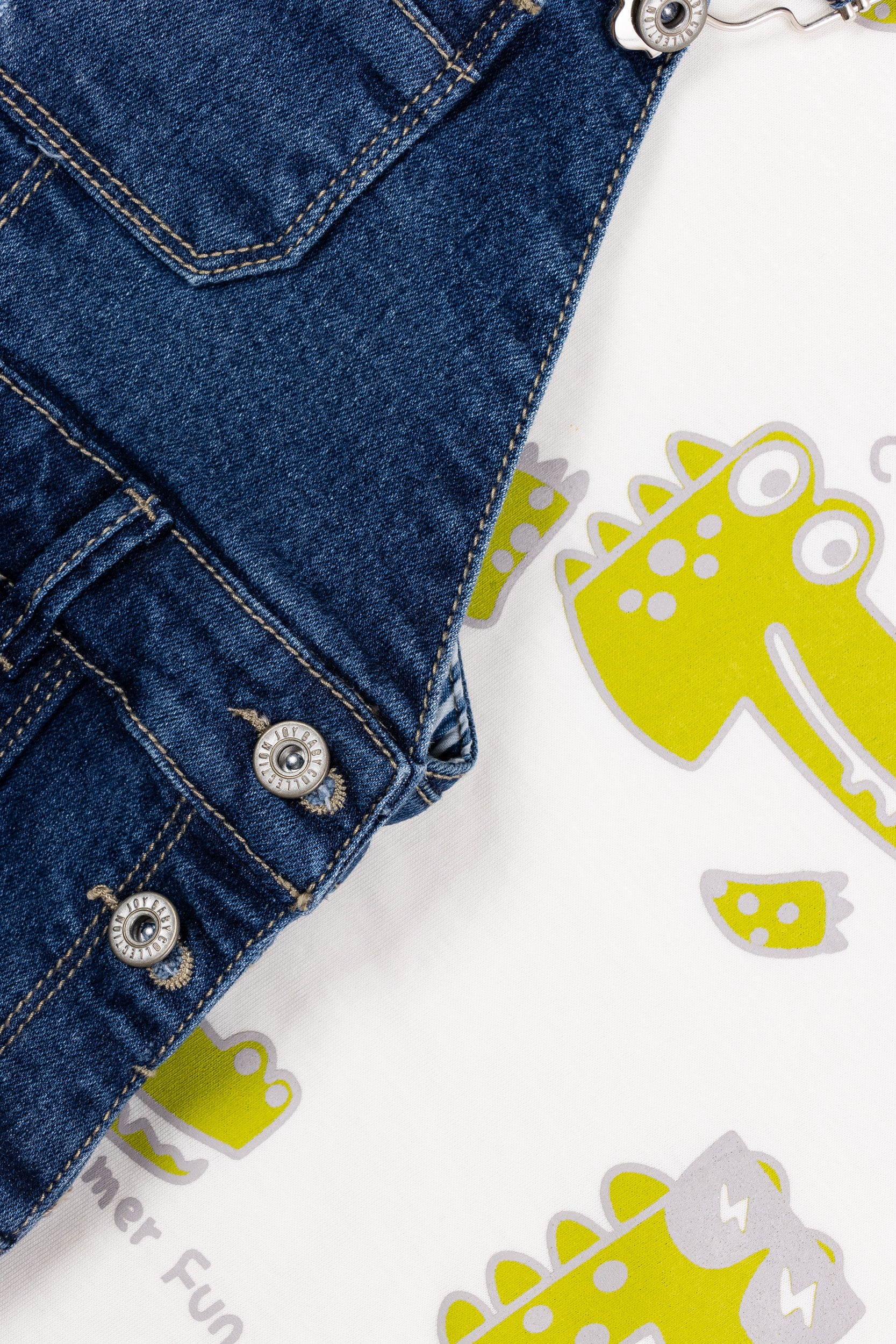 OVEROL DENIM CORTO DINOSAURIOS NIÑO BLANCO